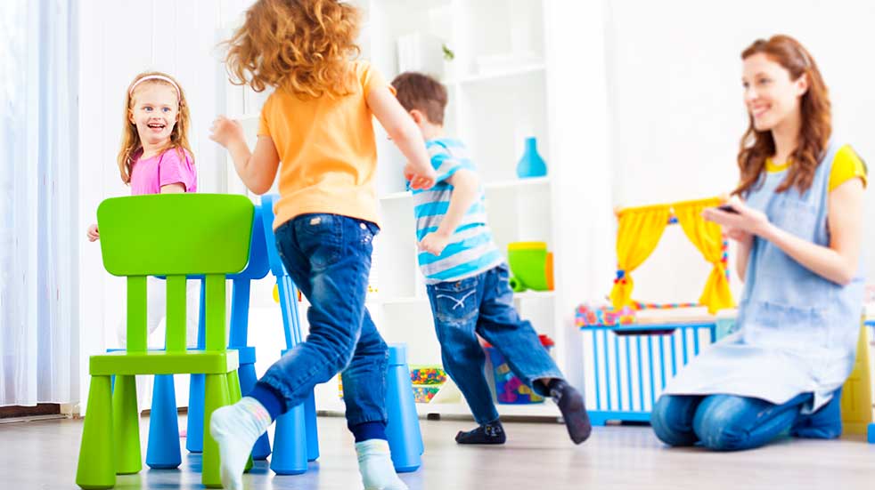 Family health and fitness children playing musical chairs